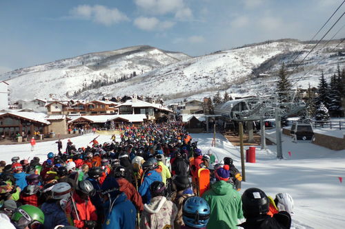 A weekend lift line at Vail. Source: Wikipedia
